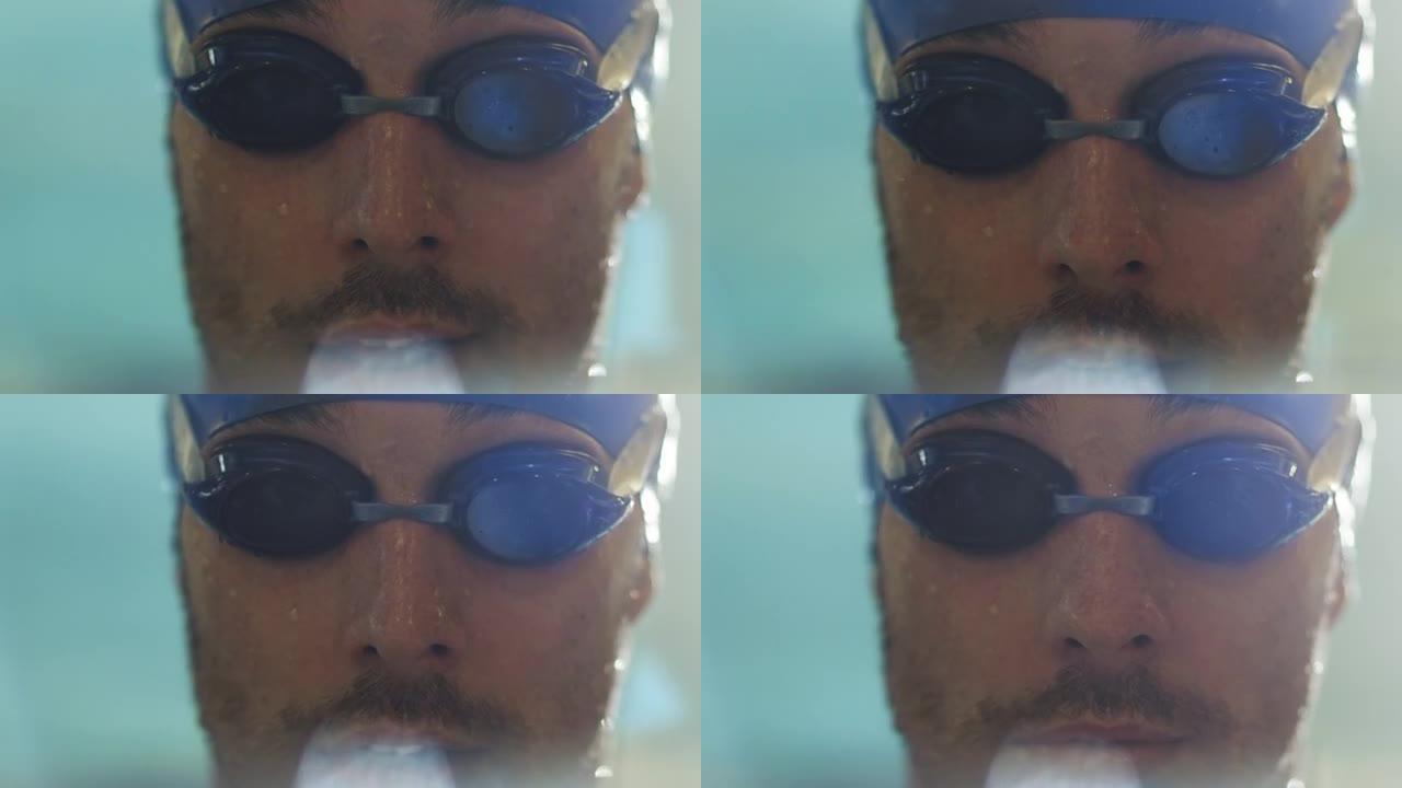 护目镜和帽子的专业游泳者的特写镜头