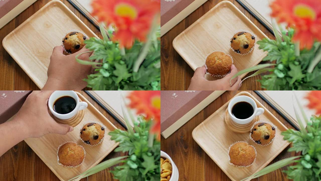 人手设置早餐套装松饼蛋糕和黑咖啡系列食品，多莉从右向左拍摄