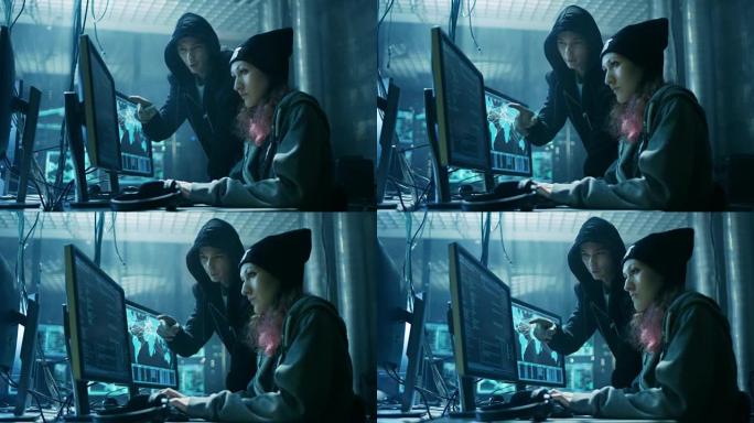 国际通缉的男孩和女孩黑客团队组织对公司服务器的高级病毒攻击。地方是黑暗的，有多个显示器。