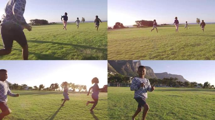 小学生在田野里追逐足球