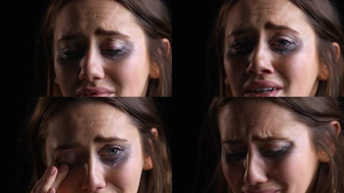 工作室肖像拍摄的哭泣的女人的污点