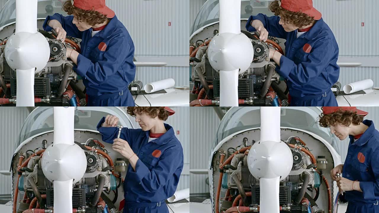 修理飞机发动机的女机械师