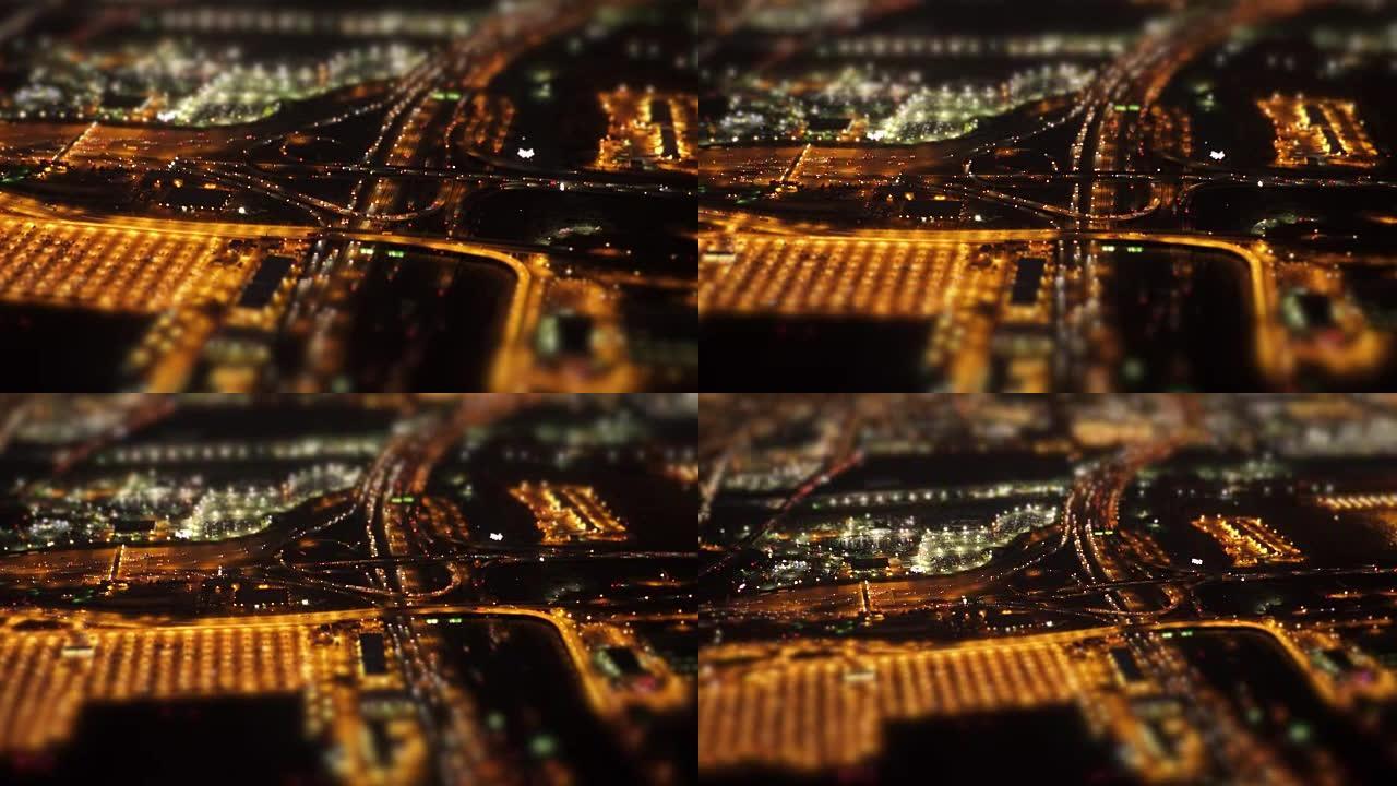 夜间现代高速公路的鸟瞰图。照亮了多个车道。
