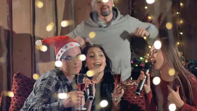 快乐快乐的朋友，喝杯香槟，在圣诞派对上玩得开心。