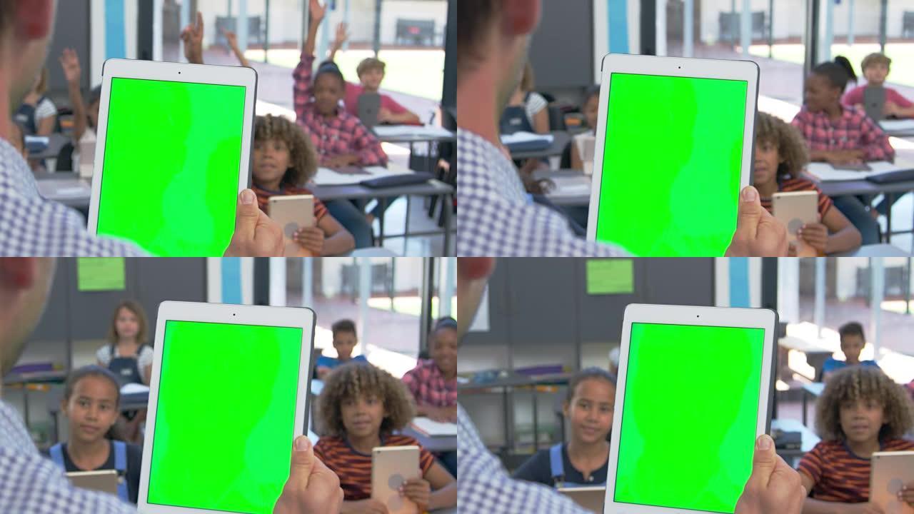 老师在学校课堂上使用平板电脑，过肩视图