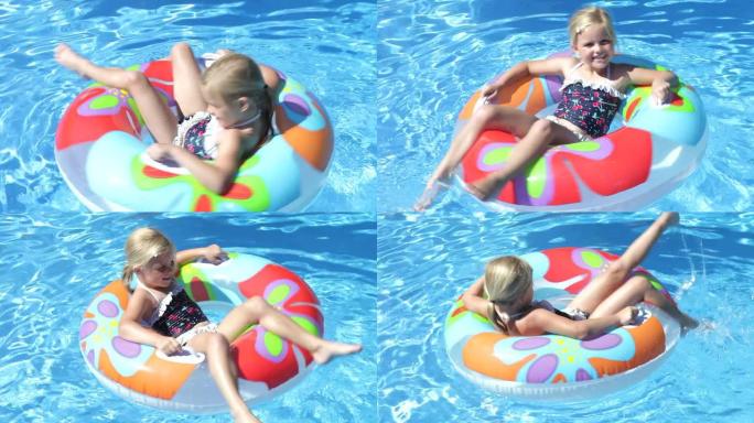 小女孩在游泳池里玩得开心