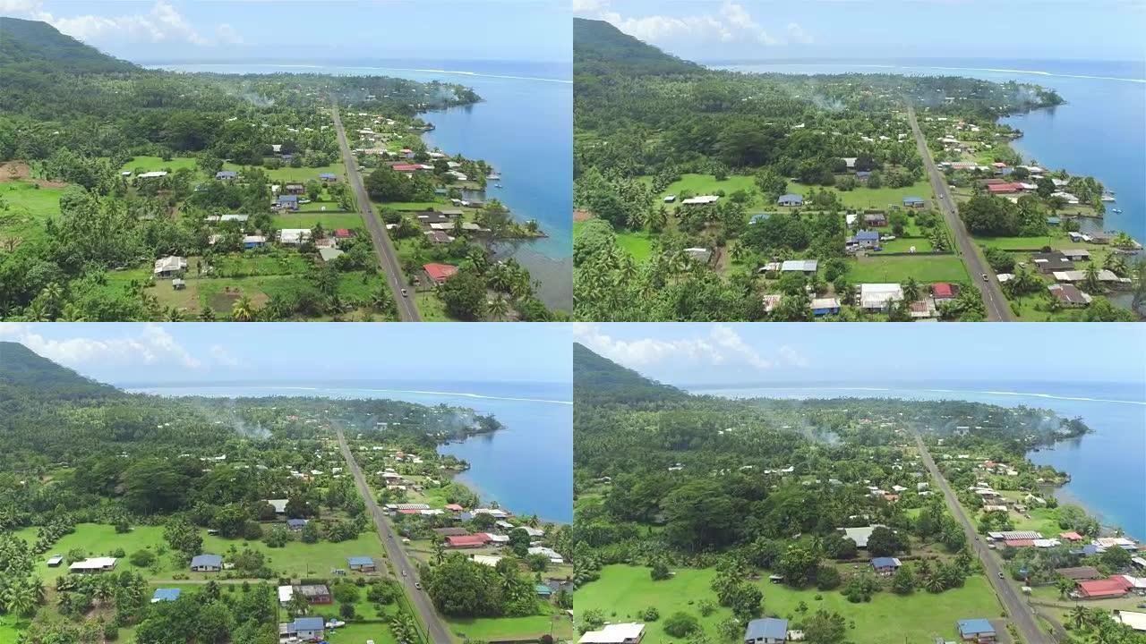 空中: 在热带岛屿大溪地的海滨海洋渔村上空飞行