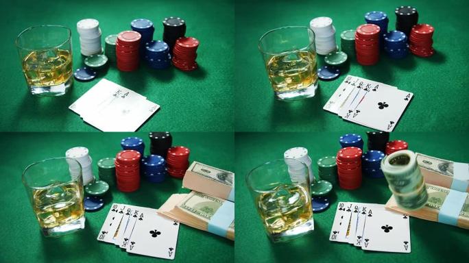 扑克牌，赌场筹码，一捆美元和一杯啤酒在扑克桌上4k