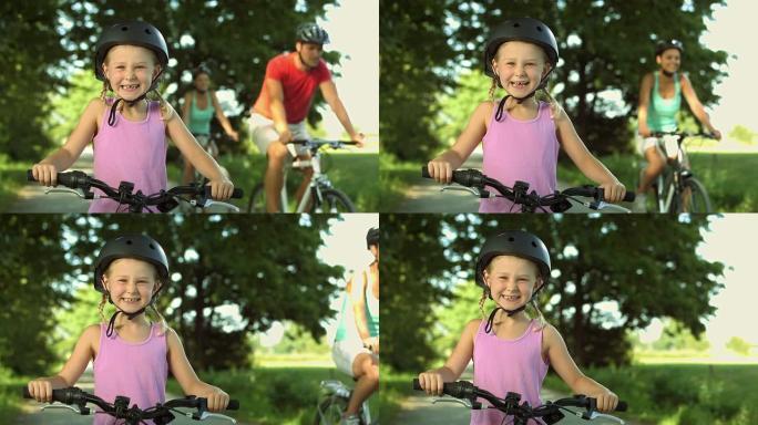高清: 一个骑自行车的小女孩的肖像
