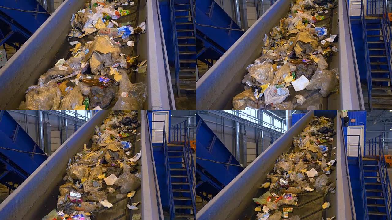 垃圾，垃圾，垃圾在回收厂的工作分类传送带上。