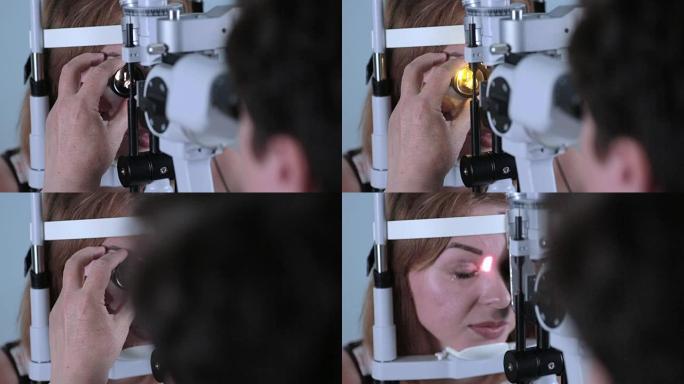 眼科医生检查妇女的眼睛