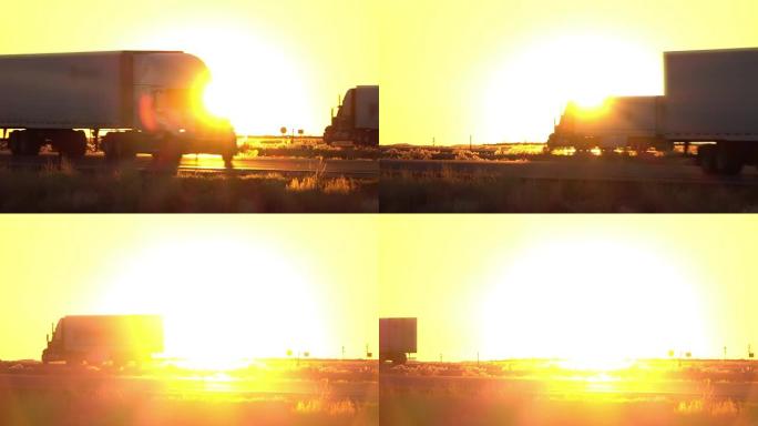 慢动作: 日出时沿着高速公路行驶的两辆面向半拖车