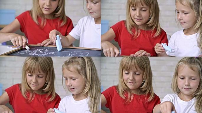 可爱的女孩一起用粉笔画画