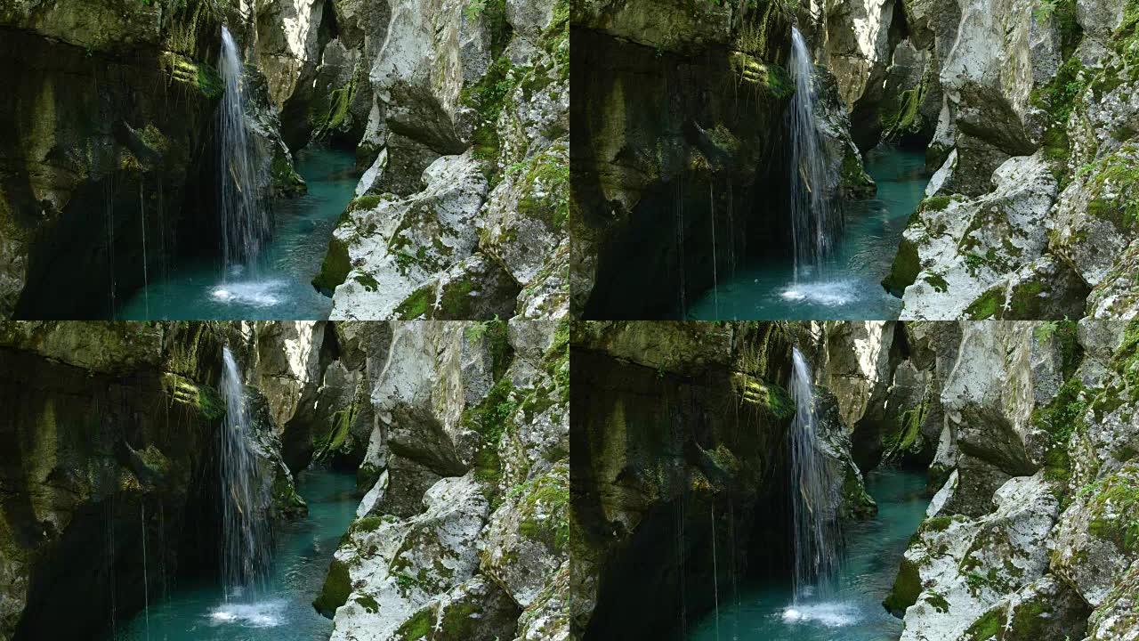 特写: 美丽的狭窄峡谷，瀑布和河流贯穿