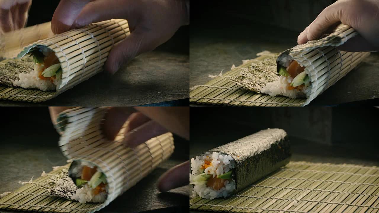 专业厨师在日本餐厅准备寿司卷