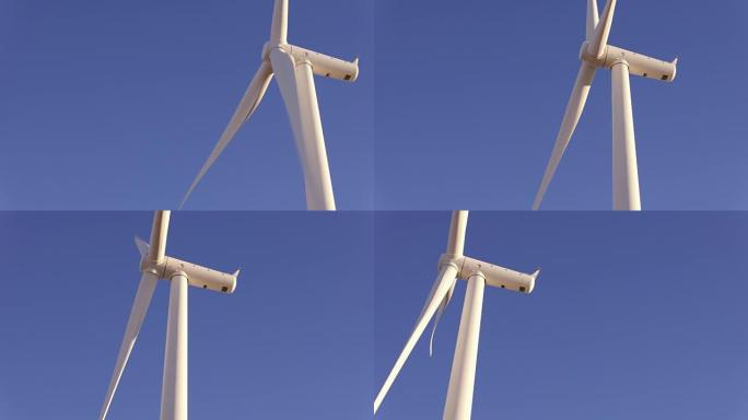 低角度隔离风力涡轮机旋转蓝天创造清洁能源