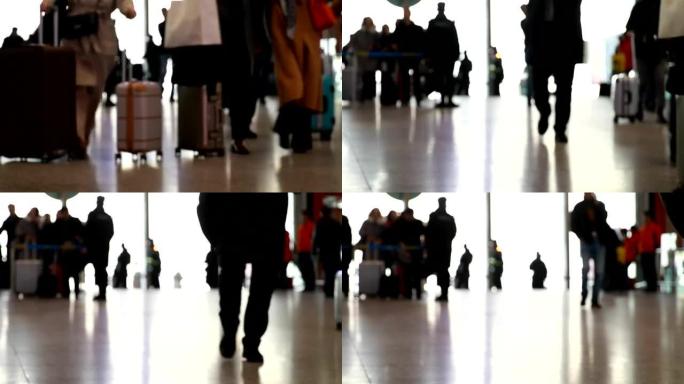 散焦的旅客在机场散步