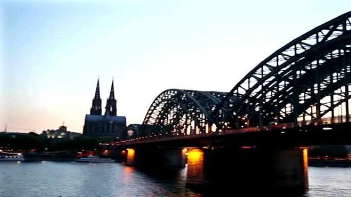 平移镜头: 德国黄昏时的科隆大教堂和霍亨索伦桥