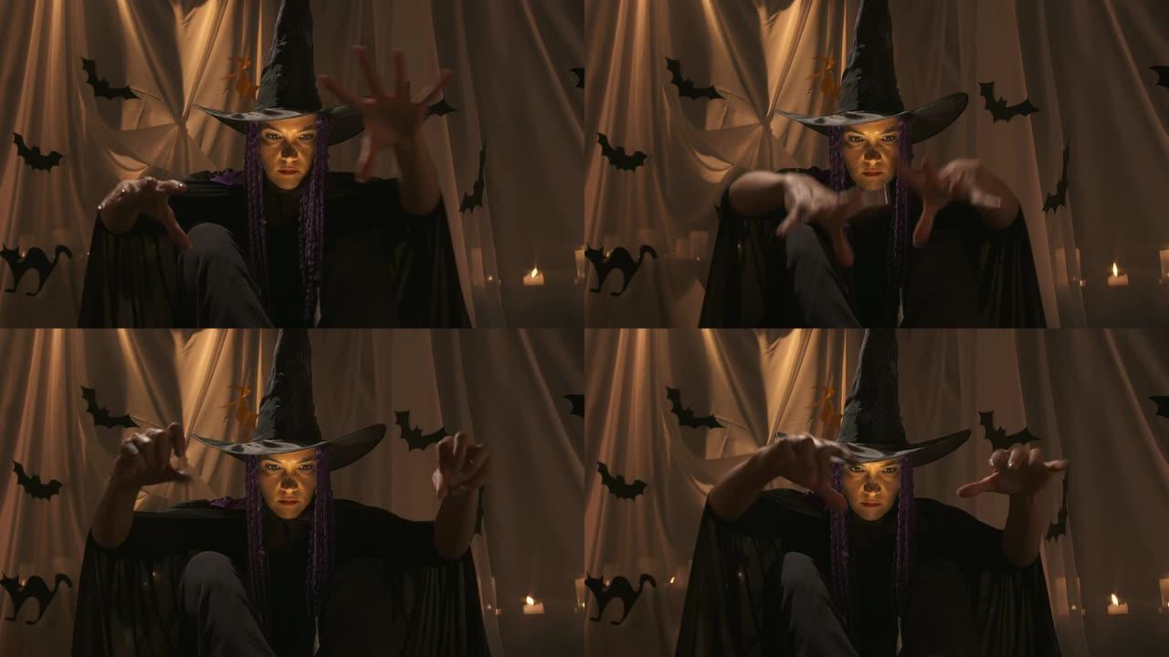 高清: 女巫用手召唤咒语