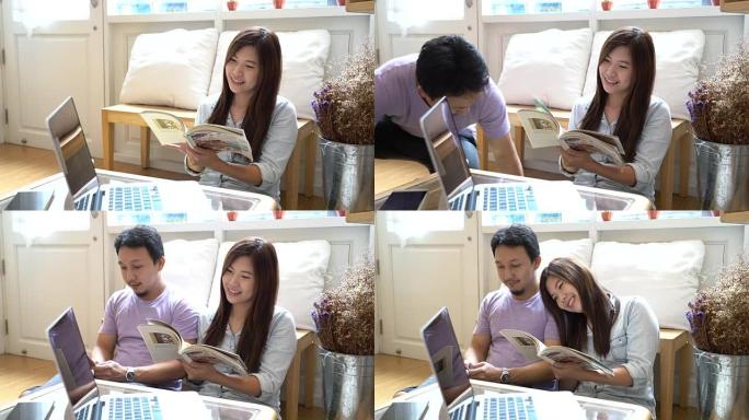 在现代的共同工作空间，情侣和生活方式概念中，穿着休闲服的亚洲女性使用充满甜蜜时刻的智能手机与男人一起