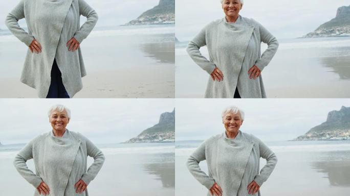 站在海滩上的高级女性肖像