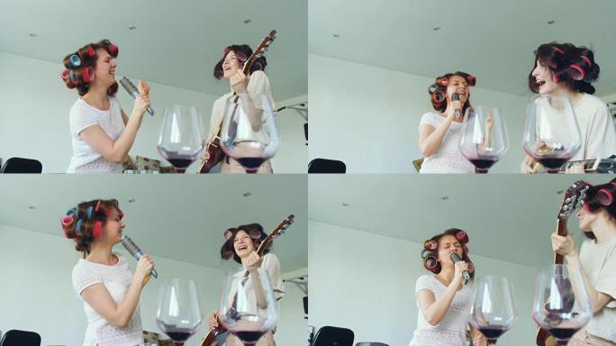两个滑稽女孩的慢动作用梳子唱歌和玩电吉他跳舞和唱歌