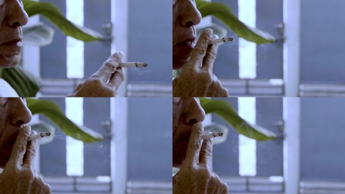 Slo Mo一名吸烟的高级男子
