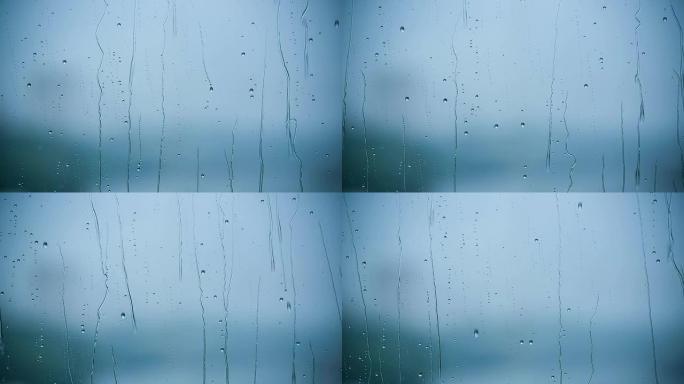 美丽的雨滴从窗玻璃上流下。高清1080。