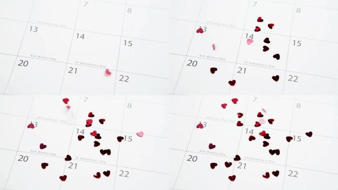 心脏五彩纸屑掉落并突出日历上的情人节