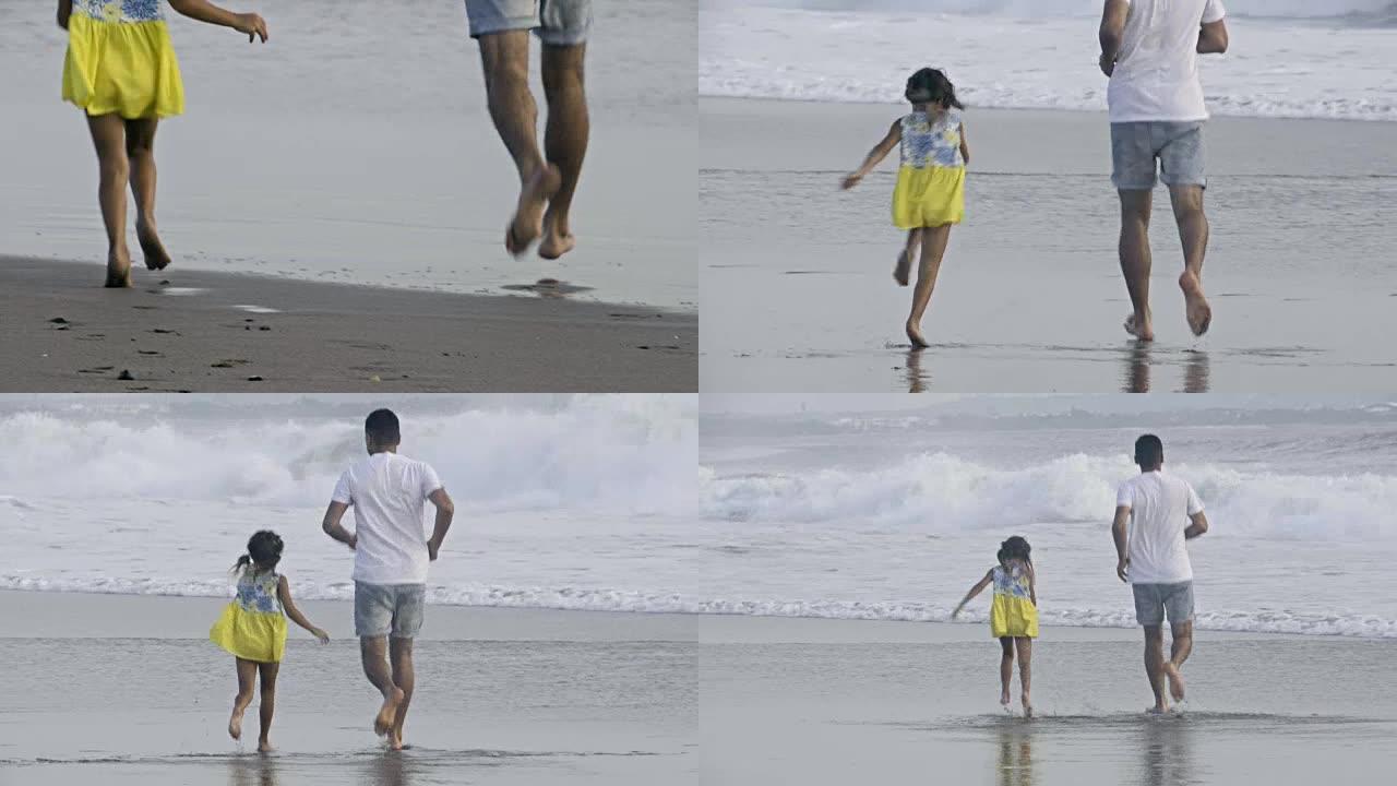 小女孩和爸爸一起跑向海洋