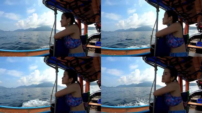 泰国沙敦利佩的泰国出租车船上的亚洲妇女