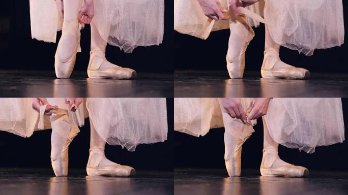 不为人知的芭蕾舞演员穿上指针鞋。特写。高清。