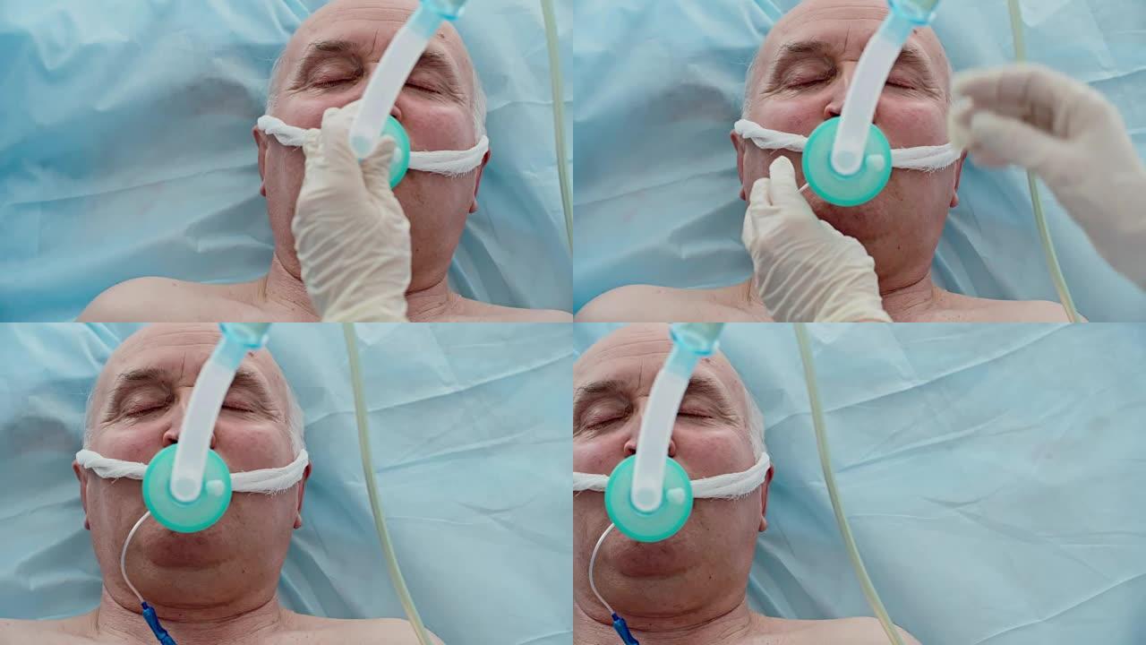带氧气面罩的昏迷患者