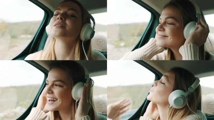 微笑的女孩在汽车后座上听音乐