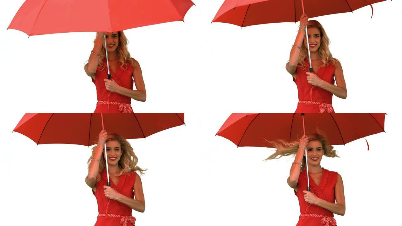 在白色屏幕上拿着雨伞的女人
