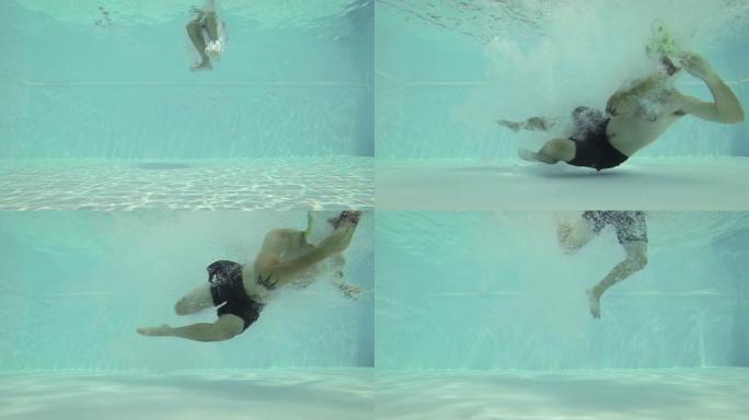 男子在游泳池中跳跃和跳水-慢动作