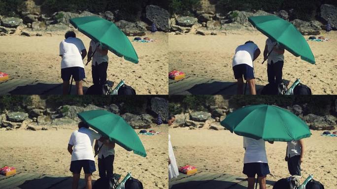 夫妇搭建沙滩伞