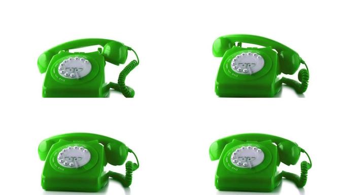 接收器落在绿色拨号电话上