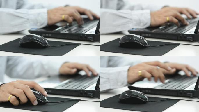 在笔记本电脑上工作的商人