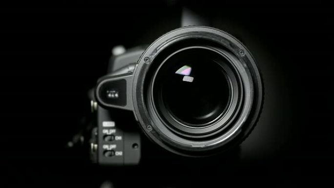 摄像机-使用变焦摄像机镜头单反相机
