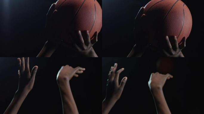 篮球运动员投掷球的手