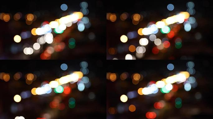 模糊的城市灯光。夜间交通