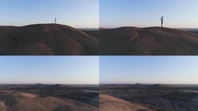 探索虚拟现实。男人张开双臂欣赏风景