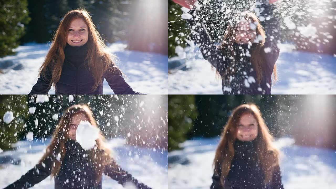 女人向空中扔雪