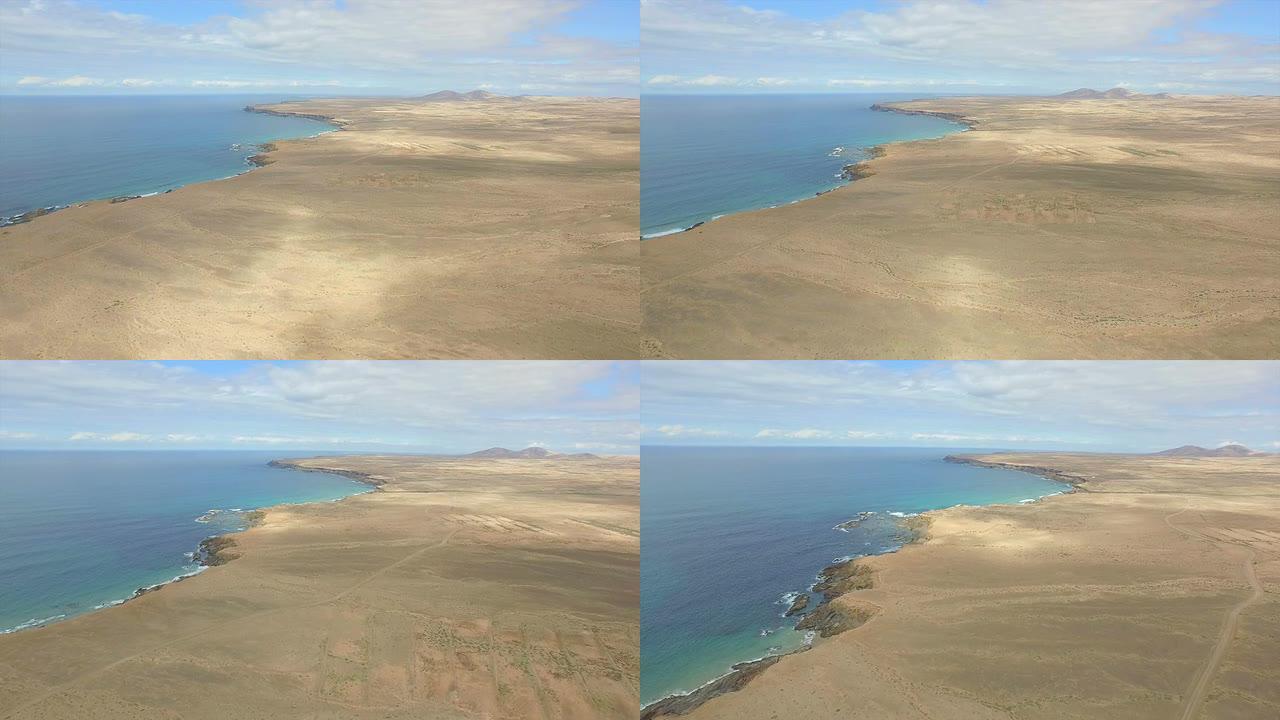 空中: 大沙质沙漠和海洋上方的高崖