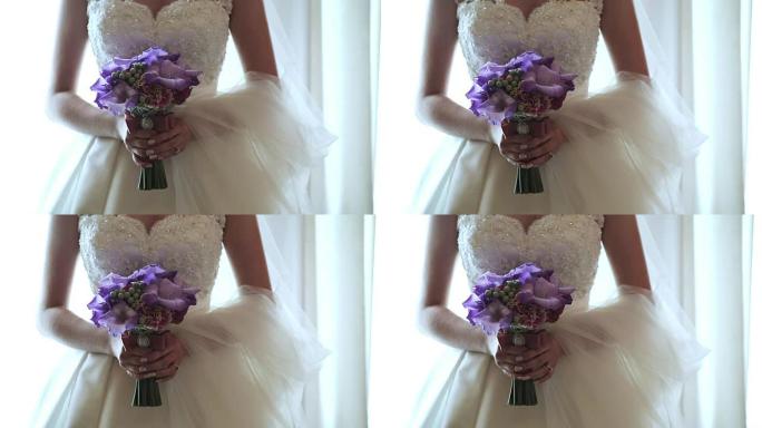新娘手里拿着婚礼花束