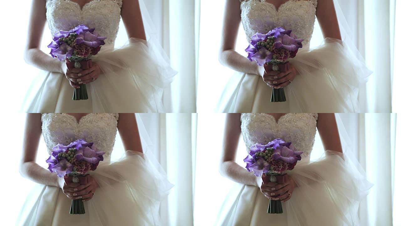 新娘手里拿着婚礼花束