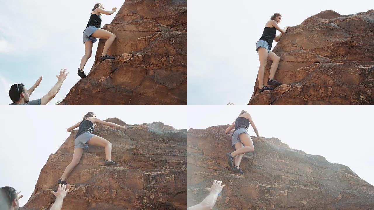 4k SLO MO: 迷人的高加索女人爬上巨石