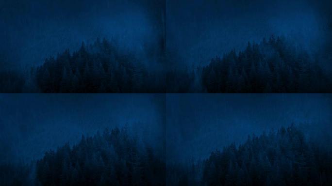 夜间雾蒙蒙的森林山坡上的降雨