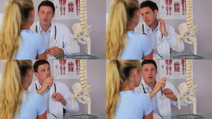 脊椎指压治疗师与他的病人交谈